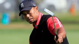 woods-tiger-putterup-032513-640x360_0