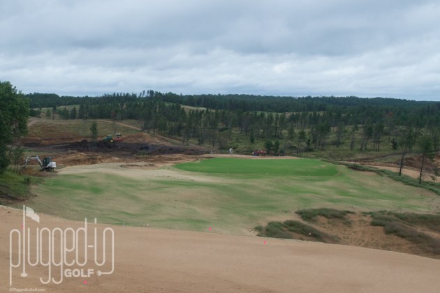 The downhill par 3 fifth.