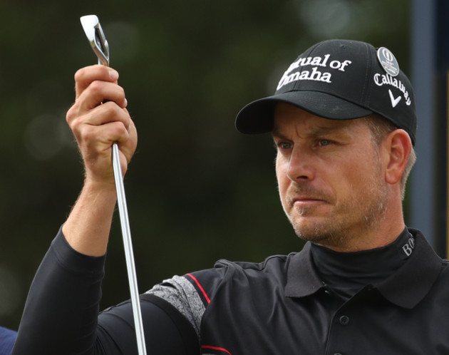 Henrik Stenson of Sweden takes his club prior to hitting his tee shot at the 12th hole during the final round of the British Open Golf Championship at the Royal Troon Golf Club in Troon, Scotland, Sunday, July 17, 2016. (AP Photo/Peter Morrison)