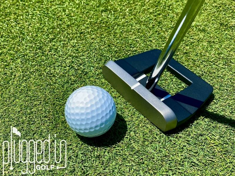Photo of the Tour Edge Zero T ZT-3 Putter with a ball close to it.