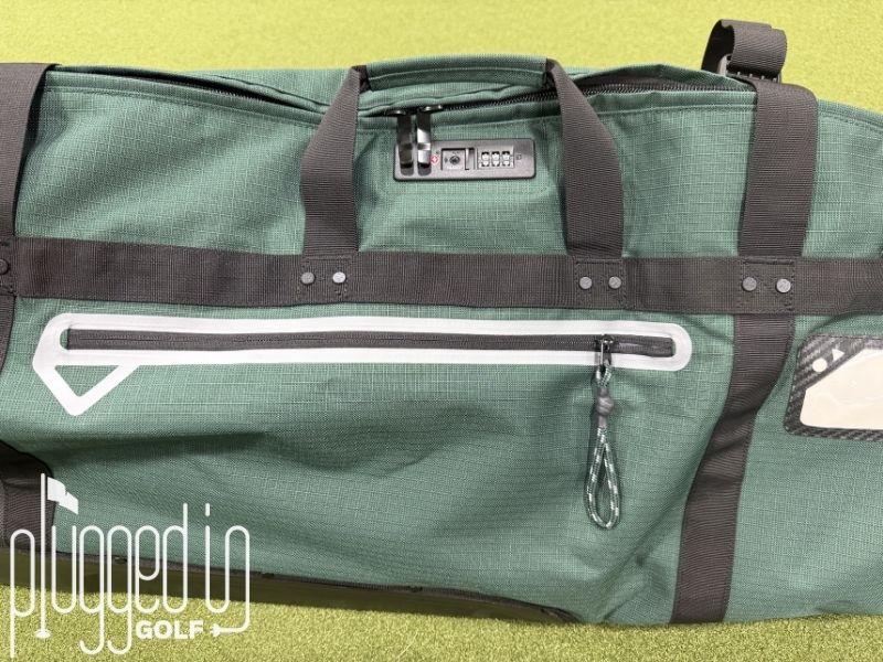 Sun Mountain ClubGlider3 Travel Bag close up view of TSA lock and pocket