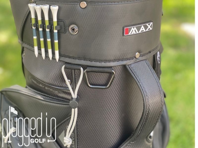 Picture of the external tee holder and accessory loop on the BIG MAX Dri Lite Silencio 3 cart bag.