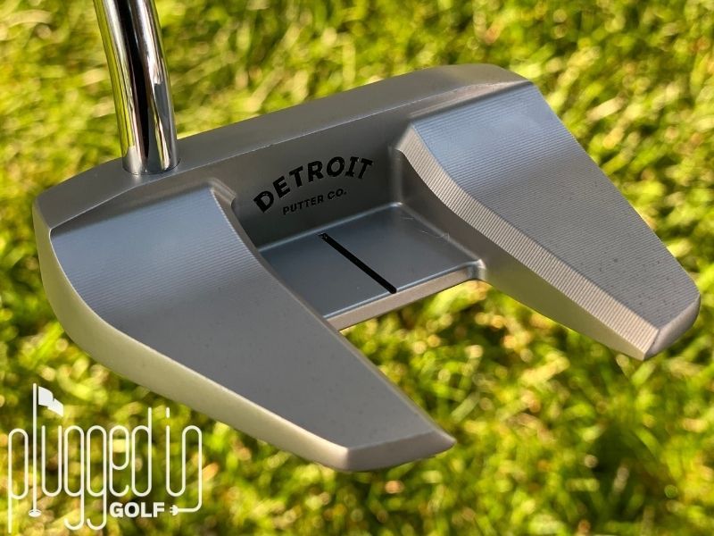 Picture of the backside, alignment aid, and fangs on The Detroit Putter Co. The Ambassador putter.