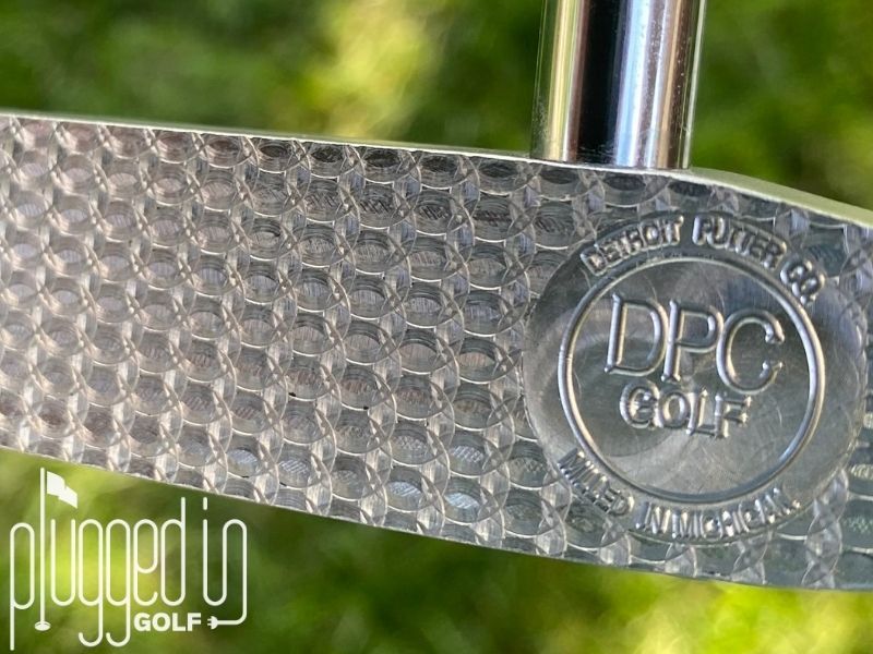 Picture of a closeup view of the DPC signature milling on The Detroit Putter Co. The Ambassador putter.
