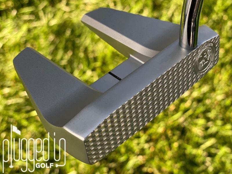 Picture of the front and side of The Detroit Putter Co. The Ambassador an its DPC signature milled face.
