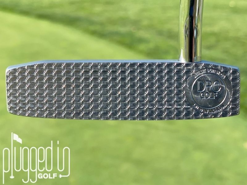 Picture of the DPC signature milling on the face of The Detroit Putter Co. The Ambassador putter.