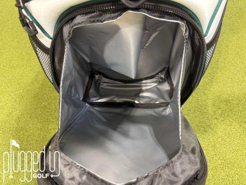 Picture of the interior of the insulated waterproof cooler pocket with drains on the Ask Echo T-Lock 4.0 Cart Bag.